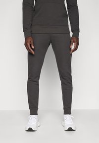 Björn Borg ESSENTIAL SWEATPANTS - Treningo apatinė dalis - pirate black