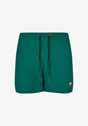 Teal herres svømmebukser med sort snor, elastisk talje, hvid syning og lille rektangulært logo-patch på nederste venstre ben.