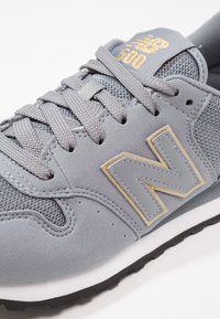New Balance GW500 - Joggesko - grey/gold