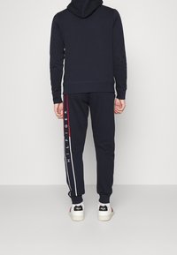 Tommy Hilfiger Träningsbyxor - dark blue