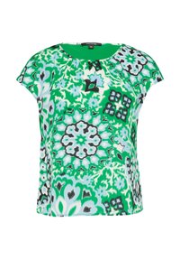 Short-sleeve top featuring a vibrant green and blue floral pattern, with a textured surface and a round neckline.