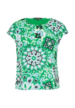 Short-sleeve top featuring a vibrant green and blue floral pattern, with a textured surface and a round neckline.