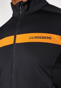 J.LINDEBERG Sports JARVIS MID LAYER - Sportinė striukė - persimmon orange
