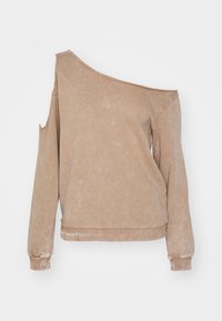 Sudadera beige asimétrica con un hombro descubierto, mangas largas, puños acanalados y una tela suave y texturizada.