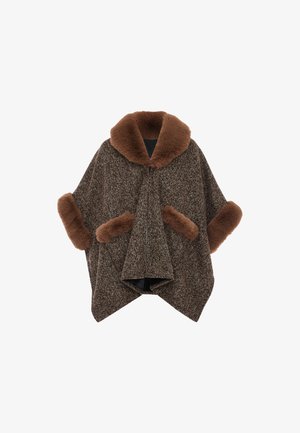 Poncho din tweed maro, cu un guler și manșete mari din blană maro, având două buzunare laterale și un fermoar central. Textură moale, formă unică.