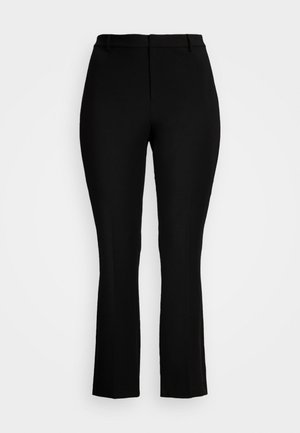 Juodos prailgintos kelnes, pagamintos iš lygios, tamprios medžiagos. Turi prigludusią juosmenį ir tvarkingas priekines siūles. Be matomų raštų ar akcentų.