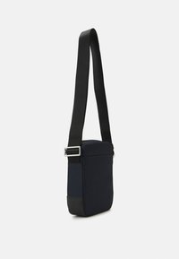 Tommy Hilfiger ELEVATED MINI REPORTER UNISEX - Umhängetasche - space blue