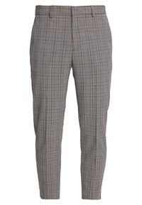 Pantalons à carreaux gris et noir. Coupe ajustée avec une texture lisse. Présente un motif plaid discret et des poches avant.