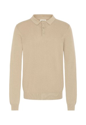 Beež pikad varrukad polo särk, mis on valmistatud pehmest kootud kangast. Omab kraed ja kolme nupuga lähenemist. Varrukate ja ääre soonikkoes detailid lisavad struktuuri.