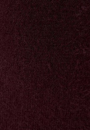 Burgundy stickad tyg med en mjuk, texturerad yta, som har en fin, tät väv och ett något luddigt utseende.