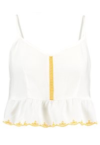 Top bianco senza maniche con un orlo a peplum, caratterizzato da un bordo scallop ricamato giallo e una striscia verticale gialla al centro.