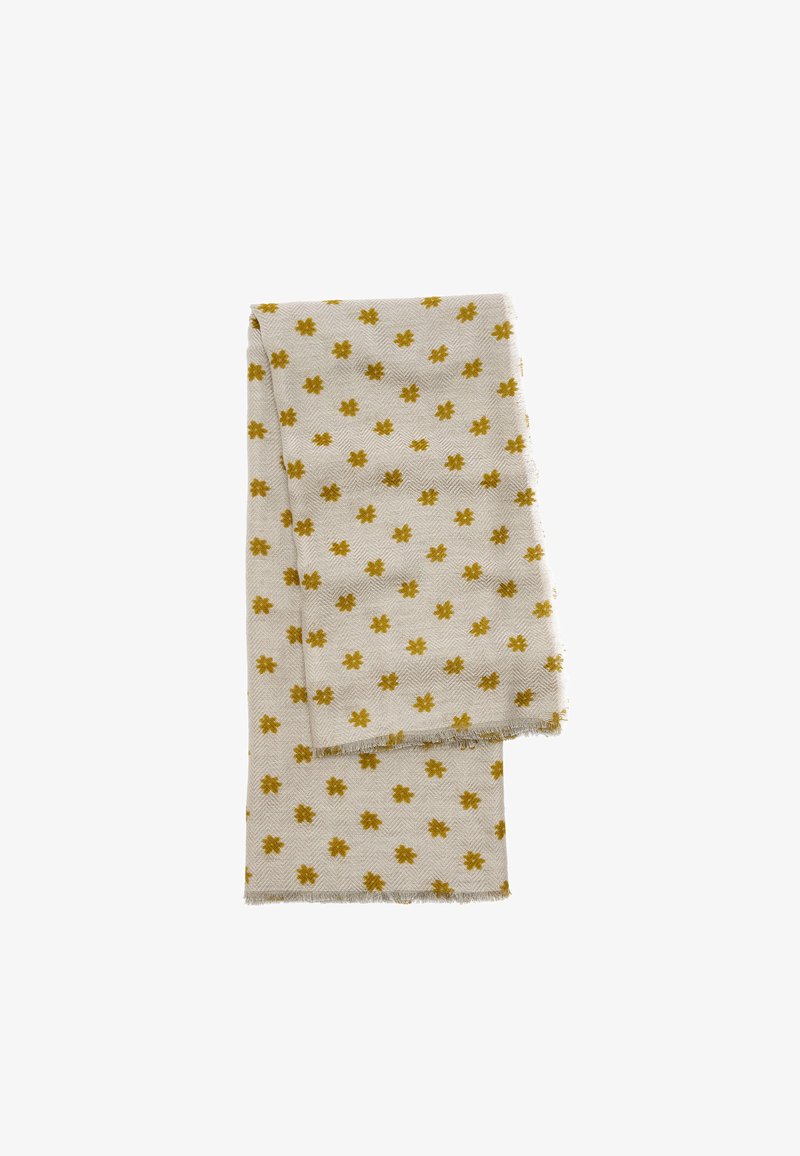 Tkań szalik w kolorze kremowym z wzorem w jodełkę, ozdobiony małymi żółtymi motywami kwiatowymi, wykończony postrzępionymi krawędziami, o miękkiej fakturze.