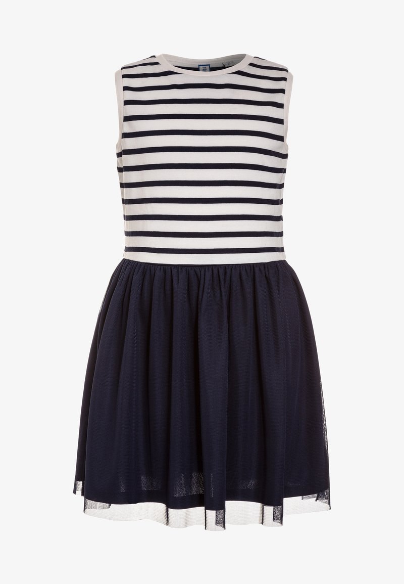 Robe sans manches avec corsage rayé horizontal blanc et noir et jupe noire unie plissée avec voile transparent.