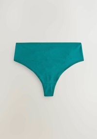 Teal katoenen string met een hoge snit. Glad textuur en elastische taille, met geen zichtbare naden of hardware. Eenvoudige, ingetogen stijl.