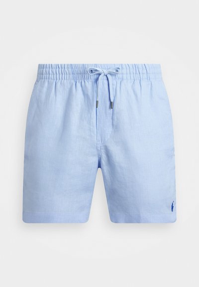 Gaiši zili lina šorti ar elastīgu jostu un auklu. Īpašība - diskretā izšūtā logo apakšējā malā. Gluda tekstūra.