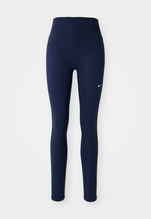 Tamno plave tajice napravljene od rastezljivog materijala, sa visokim pojasom i malim bijelim Nike logotipom na lijevoj butini.