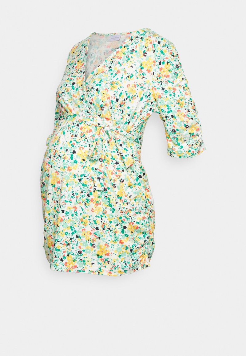 Blumige Wickelkleid, kurze Ärmel, mit einem mehrfarbigen Muster in Gelb, Grün und Pink. Hergestellt aus leichtem Stoff, mit einem Bindegürtel in der Taille.