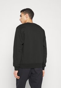 Jordan M J ESS FLC CREW - Mikina - black