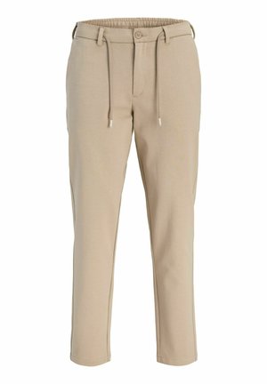 Pantalon décontracté beige avec taille élastique, fermeture bouton et zip, passants de ceinture et cordons à l'avant.