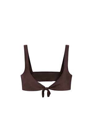 Dark brown crop top with wide shoulder straps and a front tie knot, designed for a snug, stylish fit.