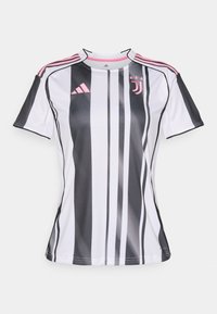 Bijela i crna prugasta nogometna majica s ružičastim detaljima, kratkim rukavima i okruglim izrezom. Sadrži Adidas logo i grb kluba.