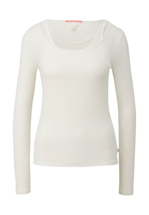 Langskoftop in crèmekleurig, gemaakt van ribbenstof; heeft een ronde halslijn en een slank ontwerp met minimale details.