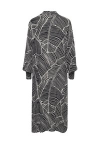 Zwart-wit patroonjurk met bladontwerpen, relaxed fit, lange mouwen en een hoge halslijn. Glad fabric met een vloeiende silhoutte.