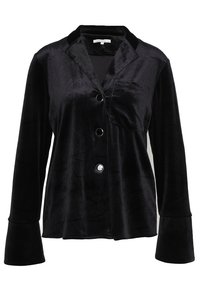 Czarna aksamitna marynarka z klapami, wyposażona w pięć czarnych guzików, jedną kieszeń na piersi oraz rozkloszowane mankiety. Gładka, miękka tekstura.