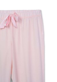 Pantaloni del pigiama rosa chiaro con elastico in vita e un fiocco abbinato. Tessuto morbido e liscio con tasche laterali e vestibilità comoda.