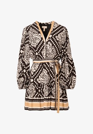 Vestito a motivo bianco e nero con maniche lunghe a sbuffo, scollo a V, cerniera, vita aderente e dettagli beige sugli accenti e sull'orlo.