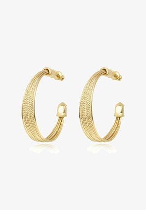 Boucles d'oreilles en or en forme de créole avec un design texturé, présentant un accent rond au niveau de la fermeture et un détail effilé à l'extrémité. Surface réfléchissante.