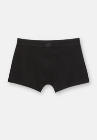 Schwarze Boxershorts aus glattem Stoff. Verfügen über einen flachen Bund mit Logoetikett und eine konturierte Tasche. Kurzes Bein-Design.