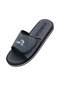 Sandale grise à glissière en tissu doux avec une texture côtelée, dotée d'une sangle et d'une semelle en caoutchouc texturé avec un bord extérieur noir.