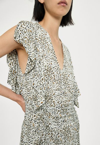 Robe à motif floral avec des manches courtes à volants et un décolleté en V profond. Fabriquée en tissu léger avec une taille cintrée et des découpes sur les côtés.
