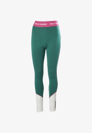 Mallas verdes con una cinturilla rosa etiquetada "HELLY HANSEN", que presentan acentos blancos en los tobillos y un diseño texturizado en todo su alrededor.