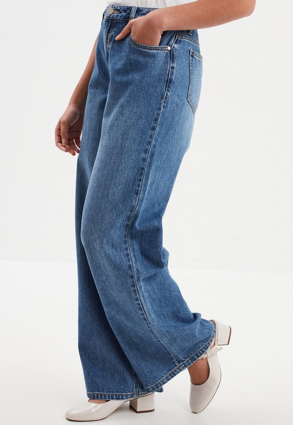 Flared Jeans - denim stone