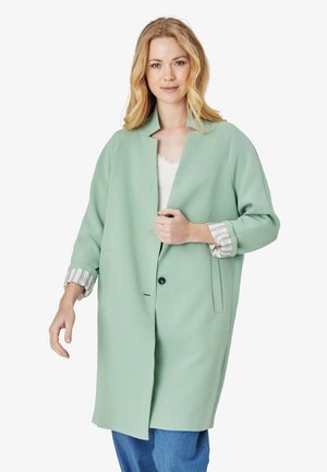 Light green, oversized coat with a notched collar, button closure, and side pockets. Features striped cuffs and a smooth texture.
