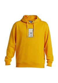 Yellow hoodie made of soft fabric. Features a front pocket, adjustable drawstring hood, and a black logo patch on the chest.