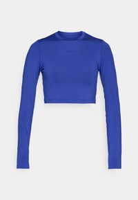 Trumpas ilgomis rankovėmis viršus ryškiai mėlynos spalvos, pagamintas iš lygaus audinio, su apvaliu iškirpimu ir nežymiu prekių ženklu priekyje.