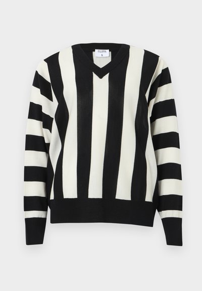 Μπλούζα V λαιμόκοψη με ασπρόμαυρες ρίγες, κάθετες στο σώμα και οριζόντιες στα μανίκια, με ριμπ μανσέτες και τελείωμα.