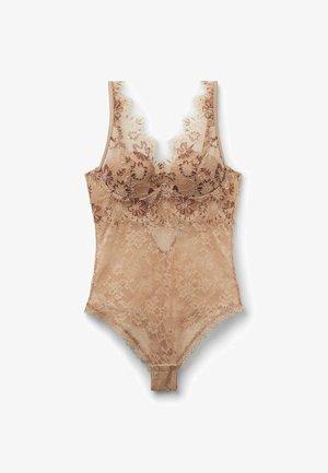 Lace bodysuit in nude, met bloemenpatronen, geschulpte randen en verstelbare bandjes. Zachte textuur met een drukknoopsluiting onderaan.