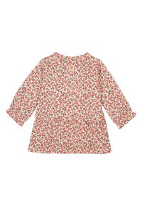 Langsleeve jurk van crèmekleurige stof, versierd met een rood en marineblauw bloemmotief. Gerimpelde taille en knoopdetail bij de halslijn.