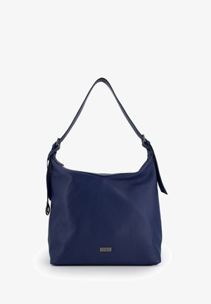 Marineblå læder skuldertaske med blød tekstur, rundet form, justerbar rem og en lille metal logo-plade på forsiden.