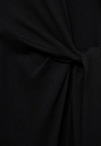 Mango MIDI WITH KNOT DETAIL - Džersejové šaty - black