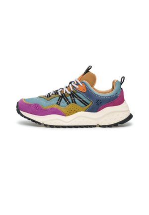 Colorful sneaker with purple, blue, mustard, and orange suede panels, patterned black and white laces, and a textured white sole.