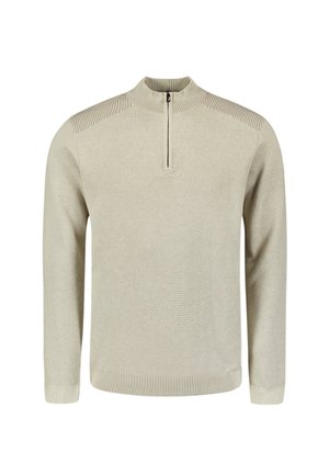 Beige gebreide pullover met lange mouwen, geribbelde kraag, manchetten en zoom, en met een korte zwarte rits bij de hals.