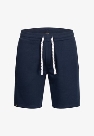 Marinblå shorts i mjukt tyg, med dragsko i midjan och vita detaljer, samt en logotyp på den nedre vänstra fållen.