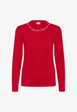 Rdeča pulover s okroglim ovratnikom in dolgimi rokavi. Ima dekorativne bisere okoli ovratnika. Narejen iz gladkega, mehkega materiala.