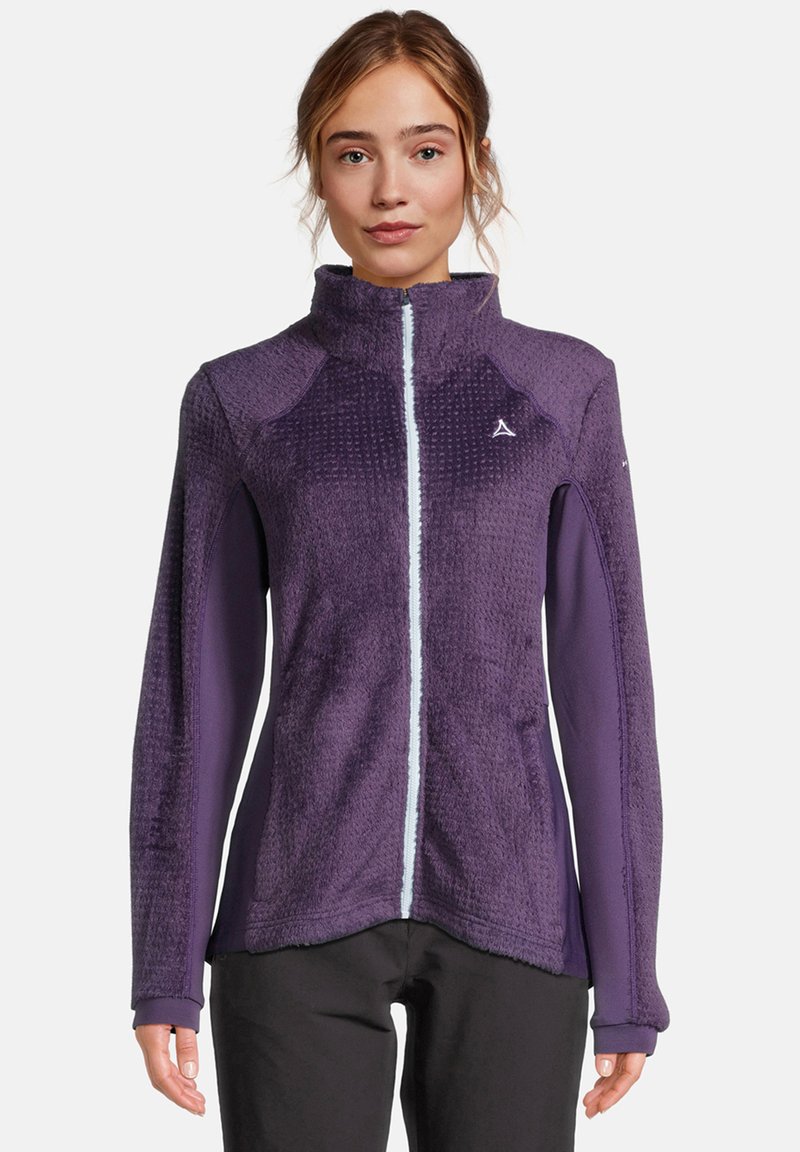 Giacca in pile viola con colletto alto, tessuto allantico e zip a contrasto. Ha maniche lisce e un logo sul petto.