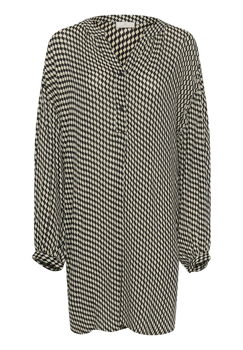 Blusa a maniche lunghe con motivo a scacchi nero e beige, con colletto e due bottoni sul davanti.